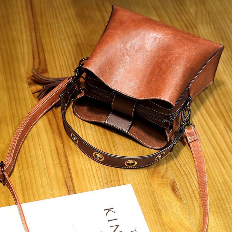 Miesten Naisten Vintage Keinonahkainen Crossbody Laukku Olkalaukut Bucket Bag Crossbody Bag