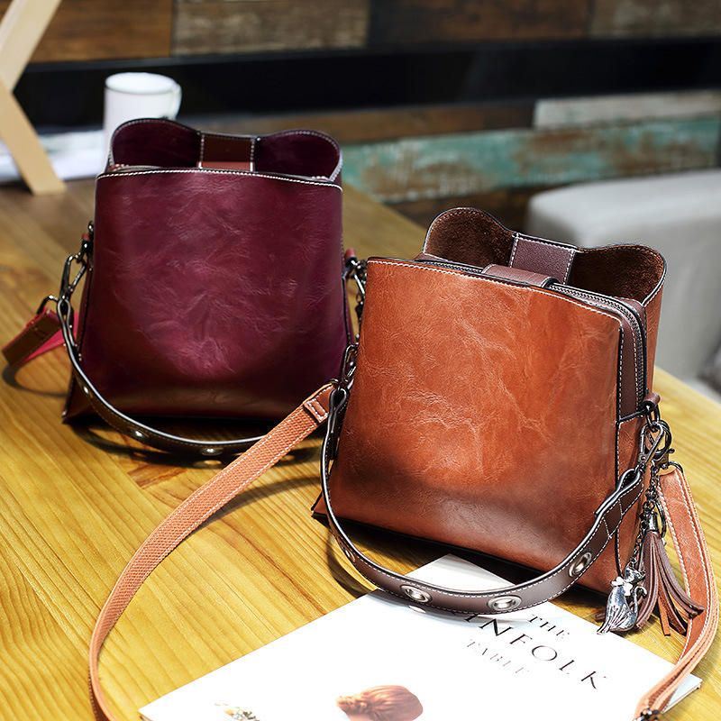 Miesten Naisten Vintage Keinonahkainen Crossbody Laukku Olkalaukut Bucket Bag Crossbody Bag